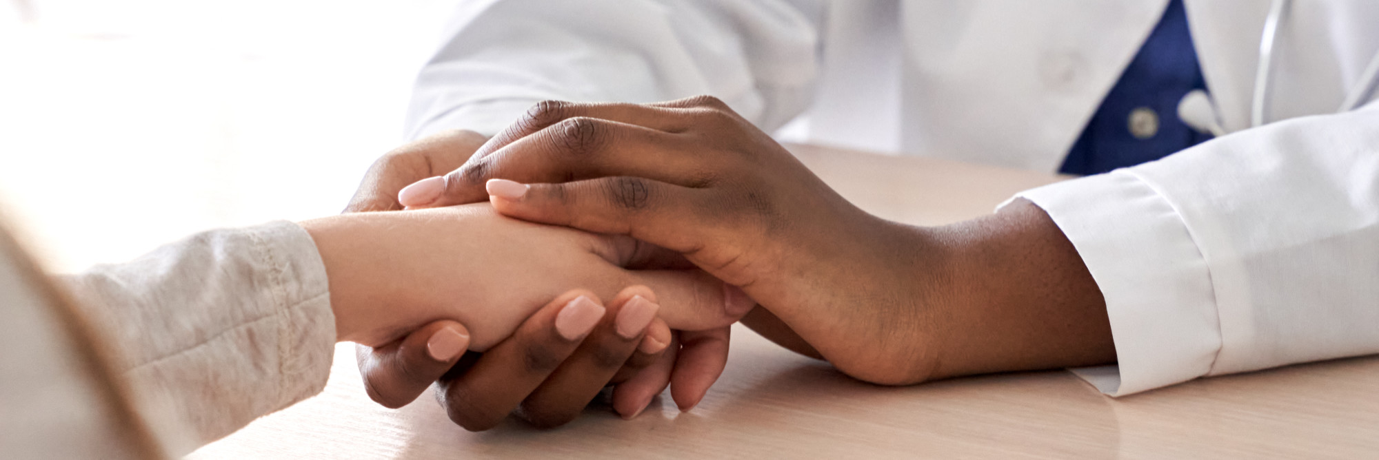 doctor comforting patient